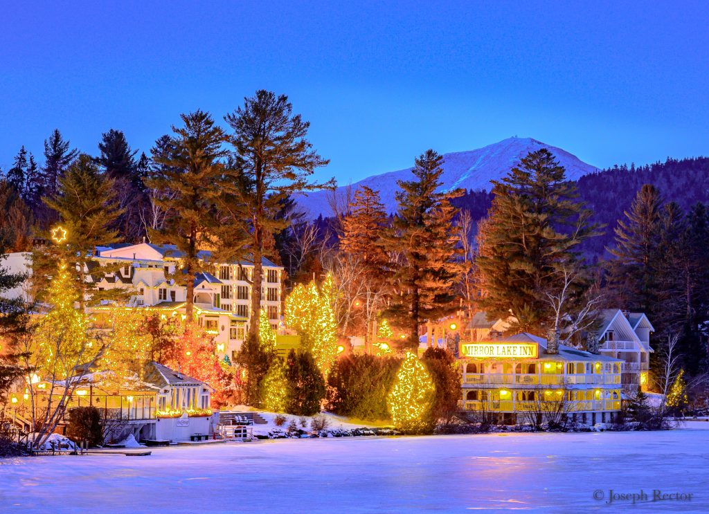 Mirror Lake Inn hotel in winter across lake view